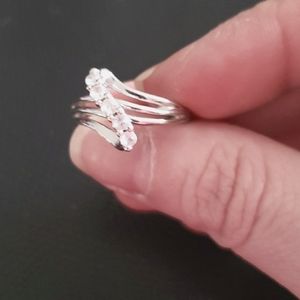 Diamond Ring In Sterling Silver setting.